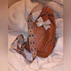 Brown Leather Sling Bag with Embellished Strap